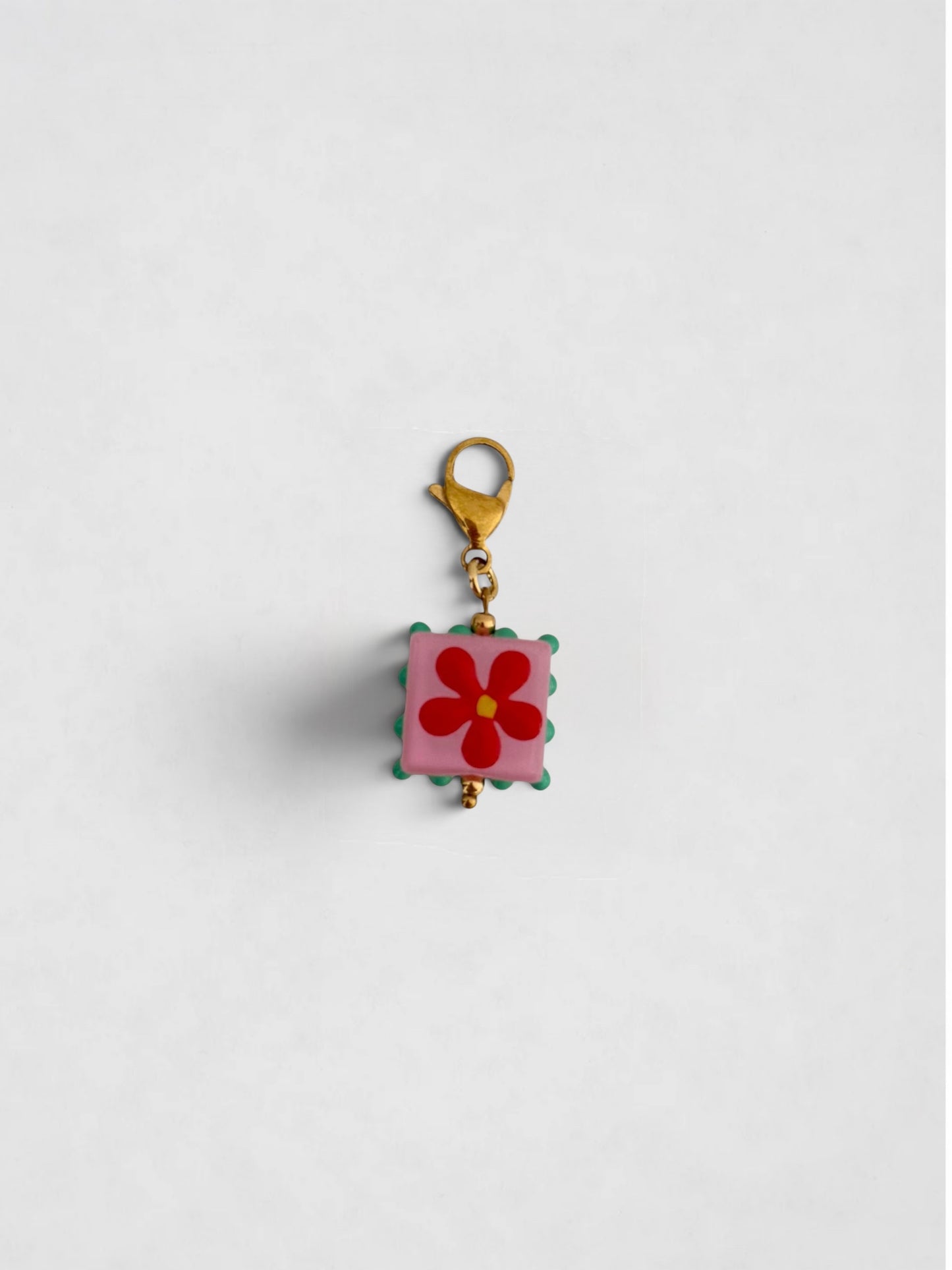 Charm Cubito rosa