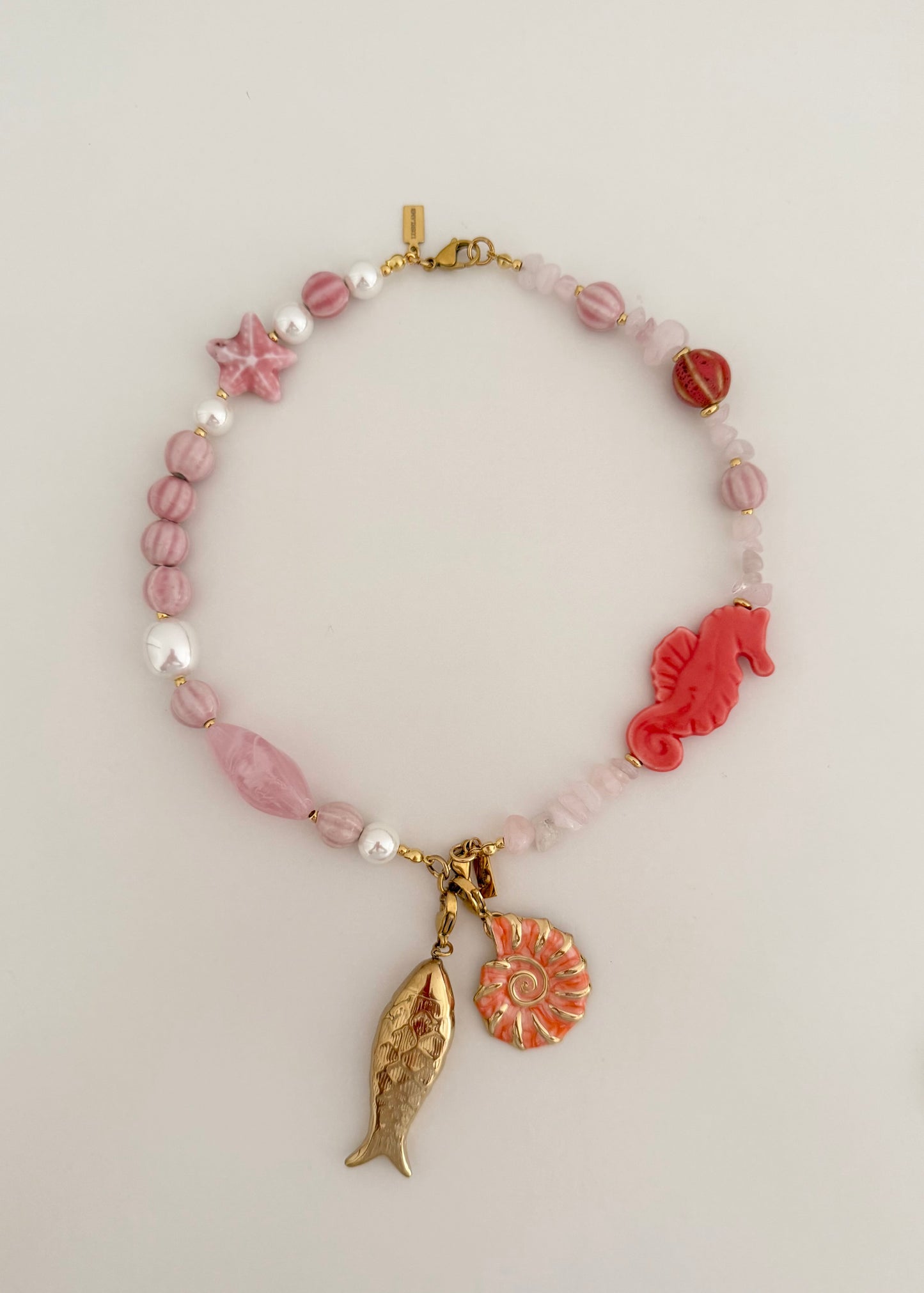 Charm pez dorado