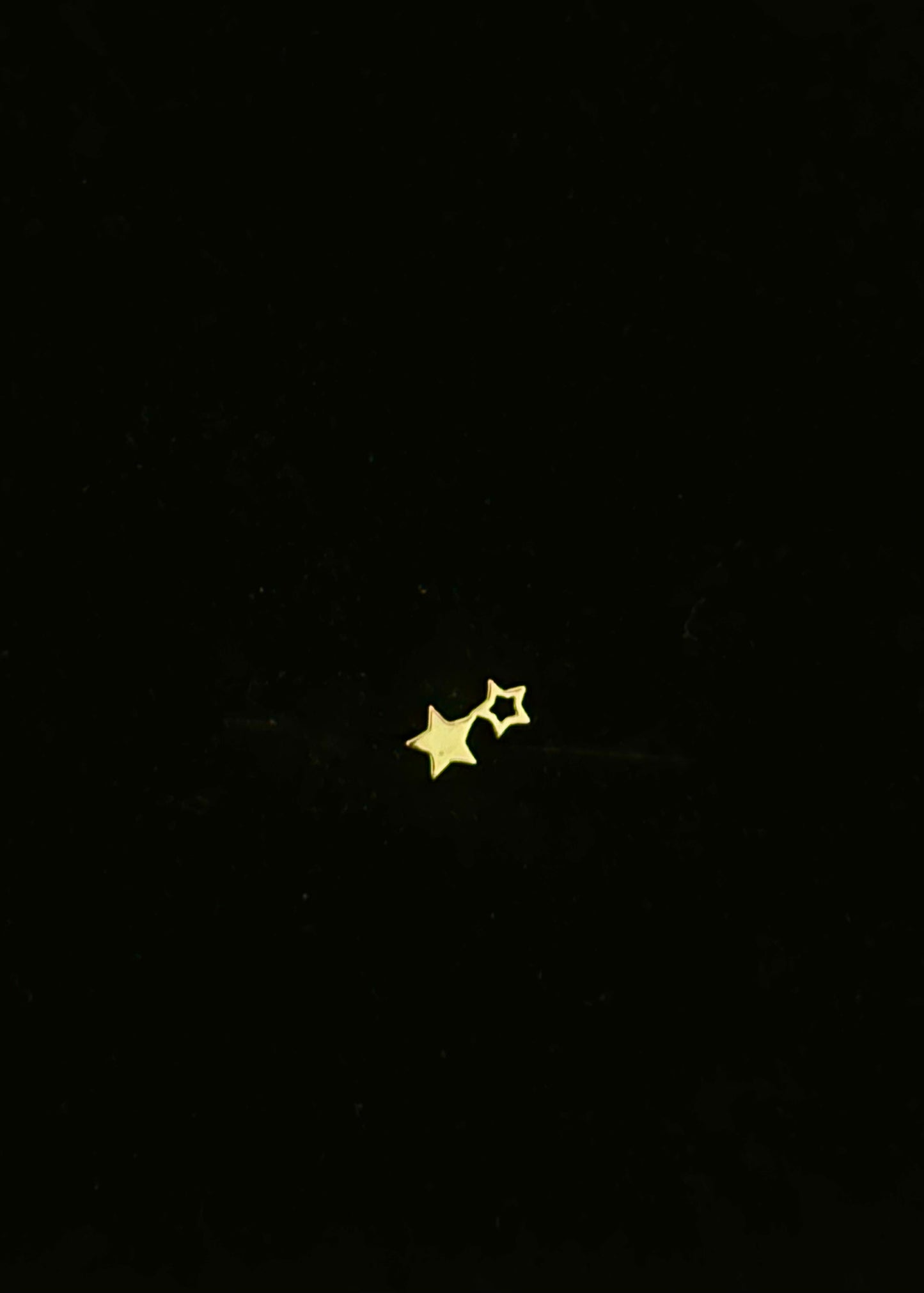Pendientes piercing dúo estrellas