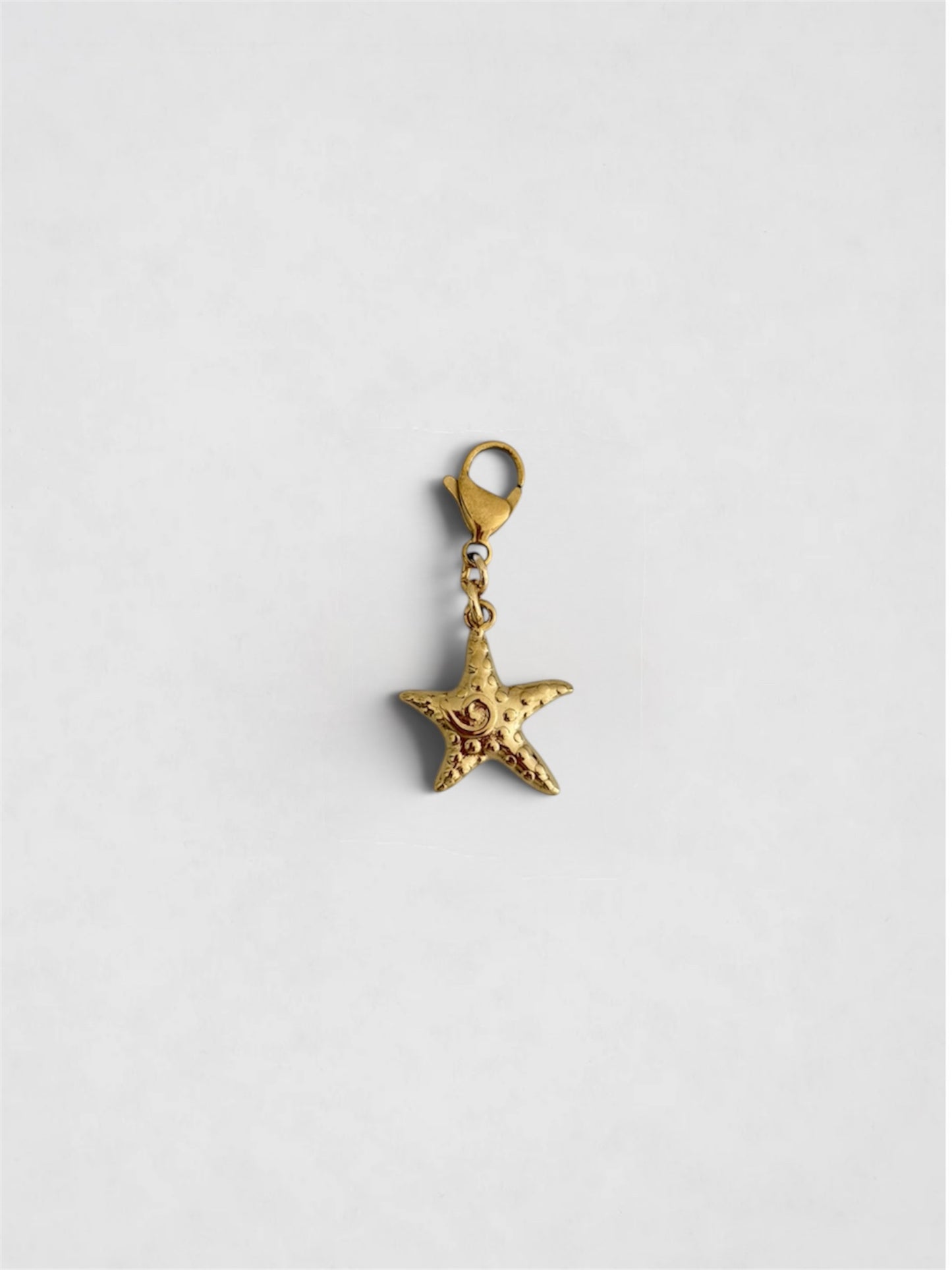 Charm Mini estrella de mar dorada