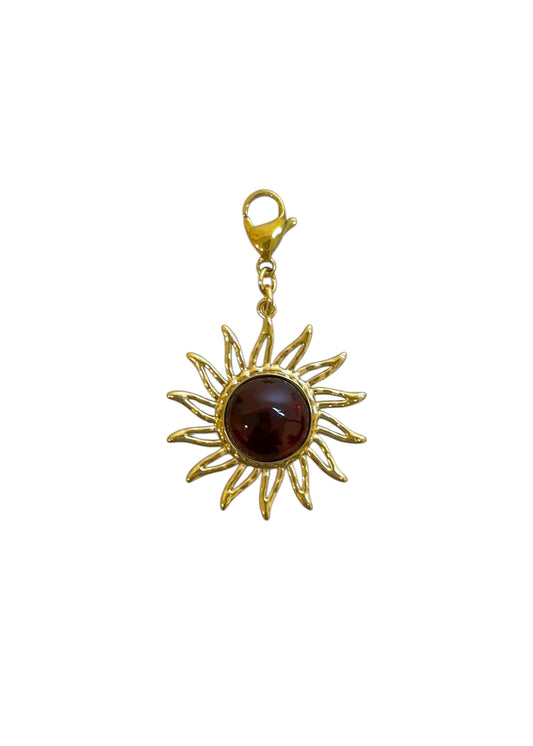 Charm Sol piedra marrón