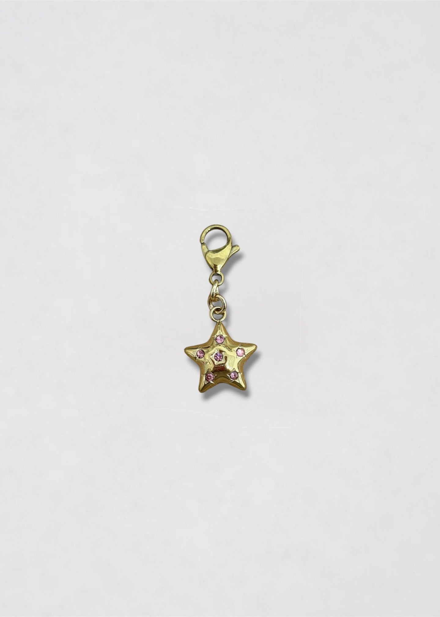 Charm Estrellita brillo rosa