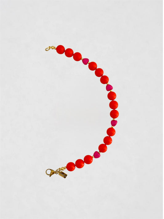 Mitad Collar Naranja y corazoncitos rosas